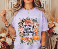 Praying mama walking beware