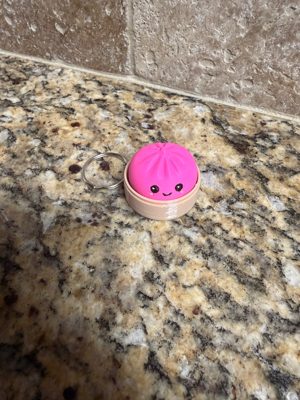 Mini hot pink dumpling clicker