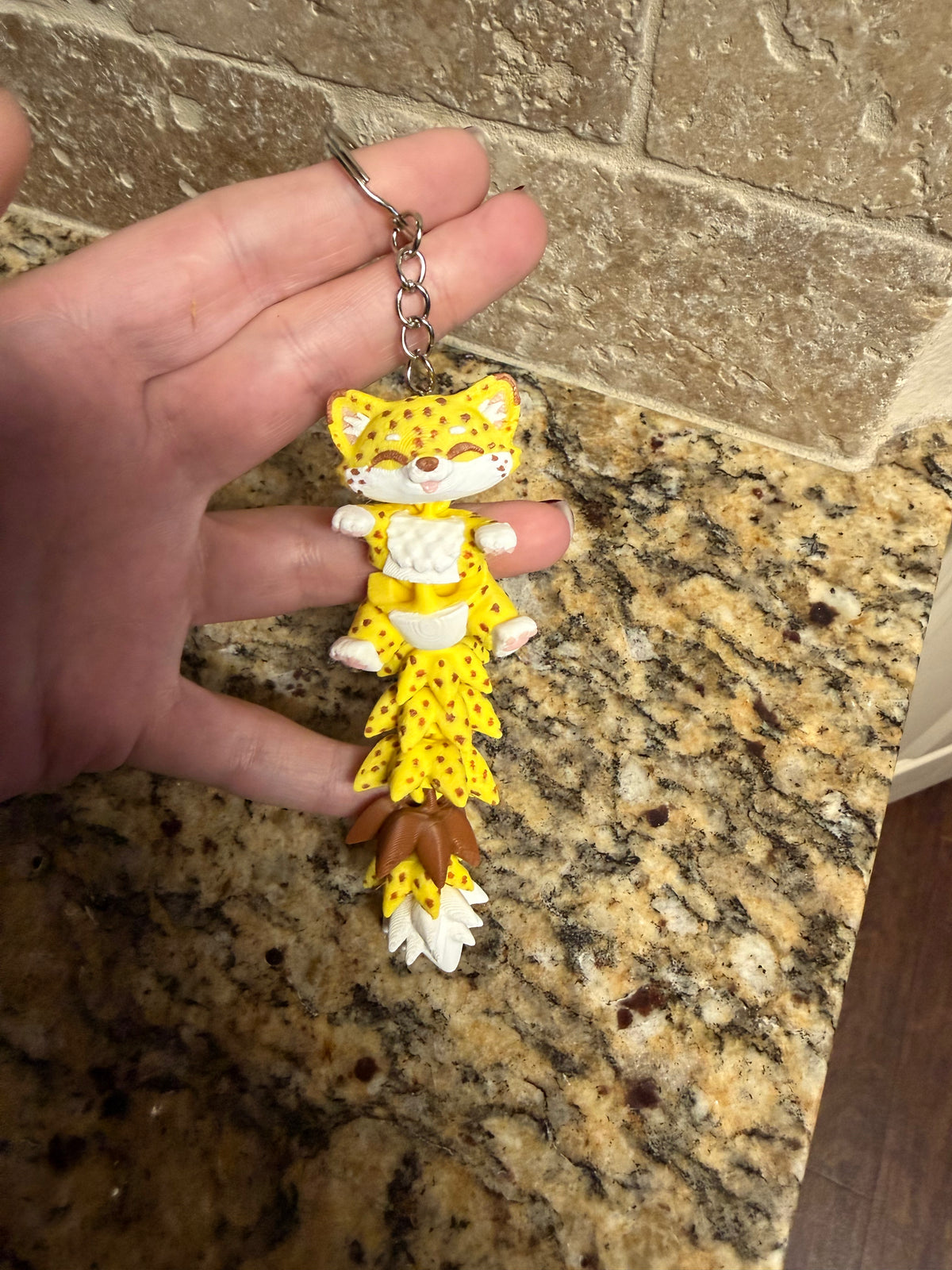 Fluffy tail cheetah keychain