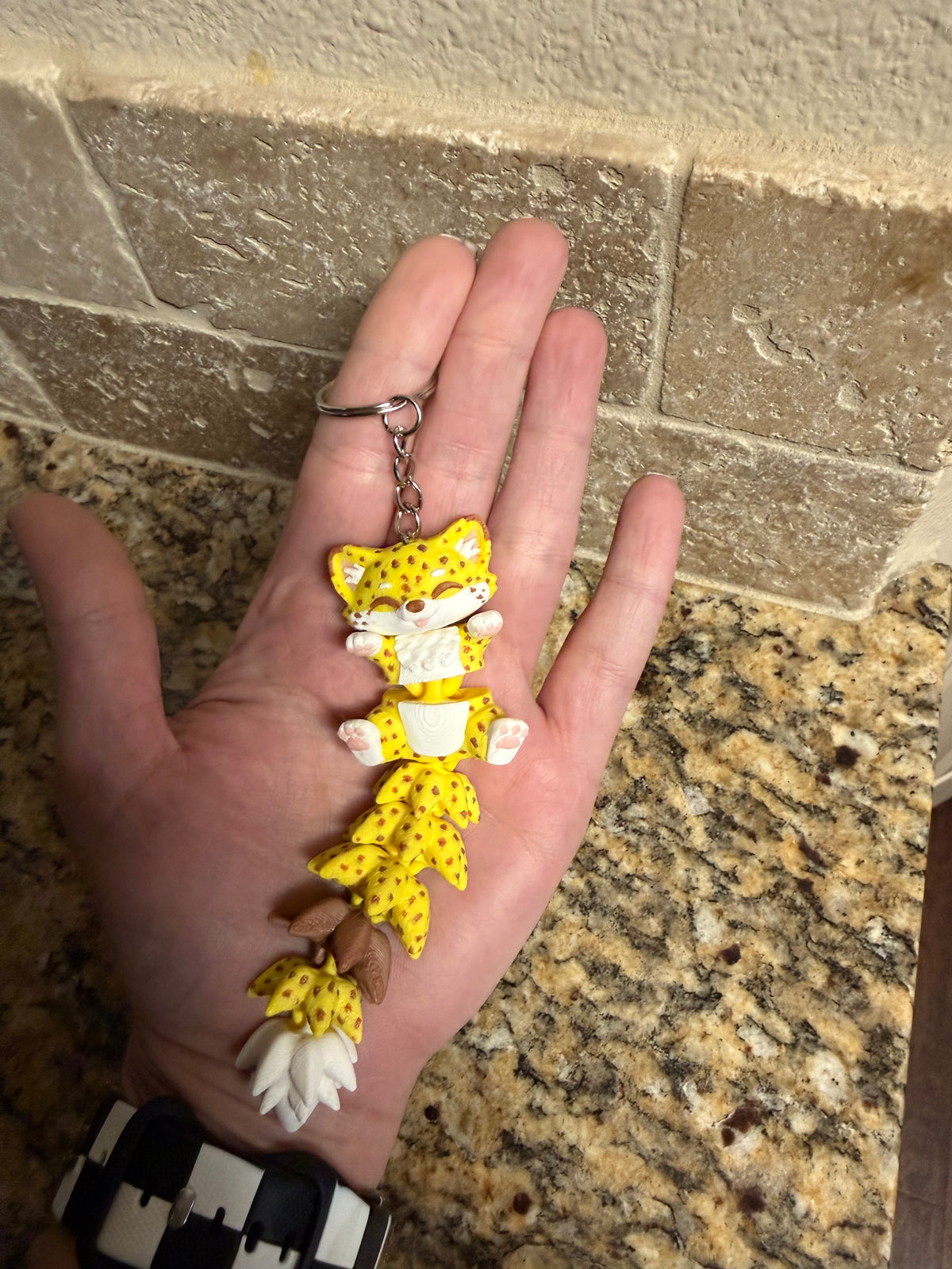 Fluffy tail cheetah keychain
